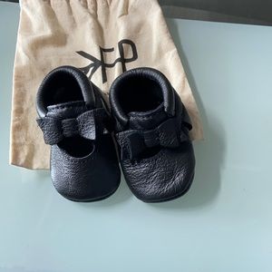 Freshly picked black bow moccs